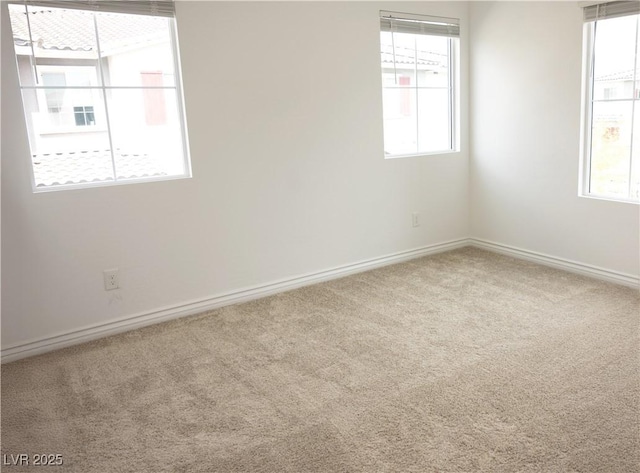 7342 N Decatur Blvd Unit 5, Las Vegas, NV 89131 - unfurnished room featuring carpet floors and baseboards