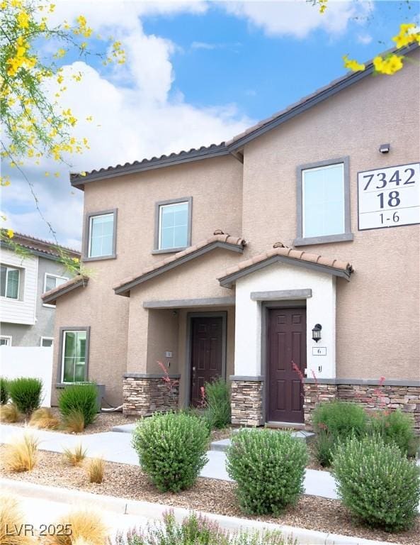7342 N Decatur Blvd Unit 5, Las Vegas, NV 89131 - view of front facade featuring stone siding and stucco siding