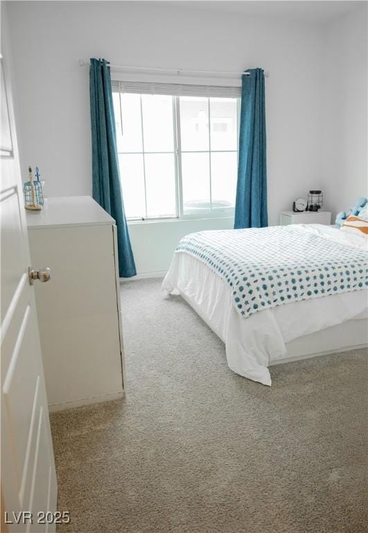 7342 N Decatur Blvd Unit 5, Las Vegas, NV 89131 - bedroom featuring light colored carpet