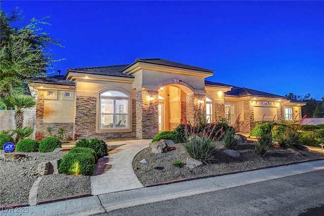 6230 Calm Brook Ct, Las Vegas, NV 89149 - view of front of home featuring stone siding, stucco siding, and a tiled roof