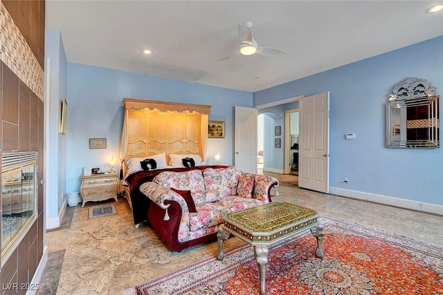 6230 Calm Brook Ct, Las Vegas, NV 89149 - bedroom with arched walkways, baseboards, ceiling fan, and recessed lighting