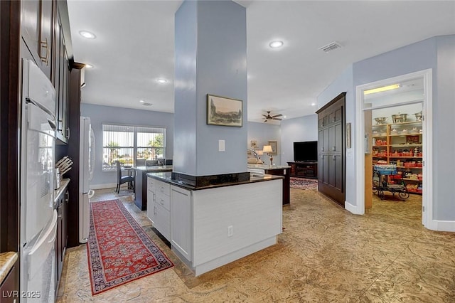 6230 Calm Brook Ct, Las Vegas, NV 89149 - kitchen featuring open floor plan, baseboards, recessed lighting, a ceiling fan, and dark countertops