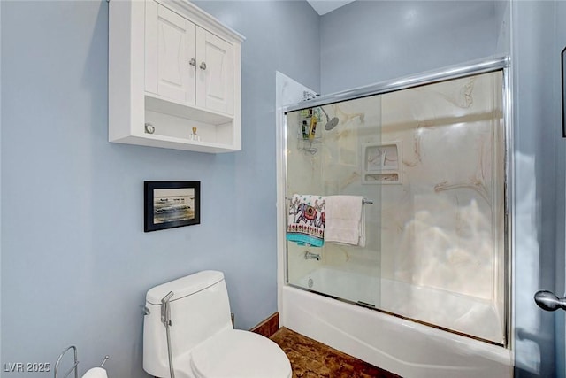 6230 Calm Brook Ct, Las Vegas, NV 89149 - bathroom featuring bath / shower combo with glass door and toilet