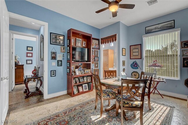 6230 Calm Brook Ct, Las Vegas, NV 89149 - dining space with ceiling fan and baseboards