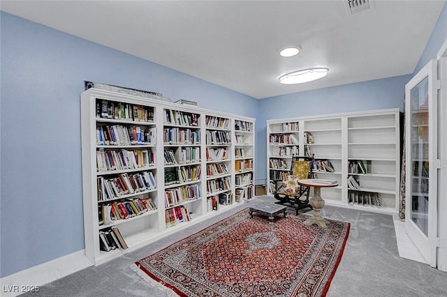 6230 Calm Brook Ct, Las Vegas, NV 89149 - living area with bookshelves and carpet