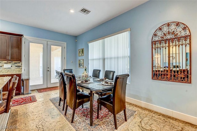 6230 Calm Brook Ct, Las Vegas, NV 89149 - dining room featuring french doors and baseboards