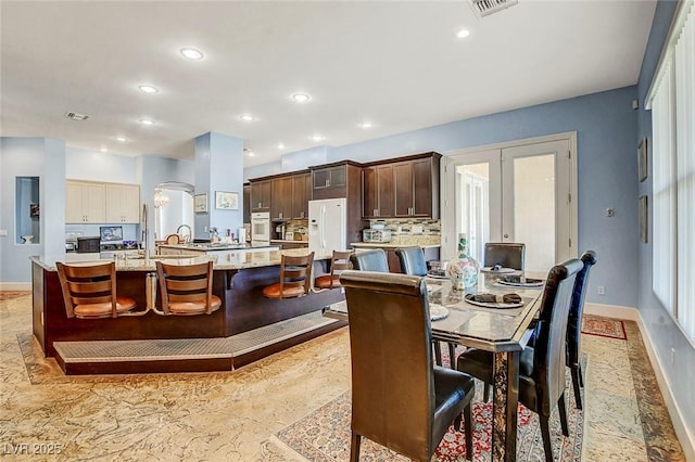 6230 Calm Brook Ct, Las Vegas, NV 89149 - dining space with baseboards and recessed lighting
