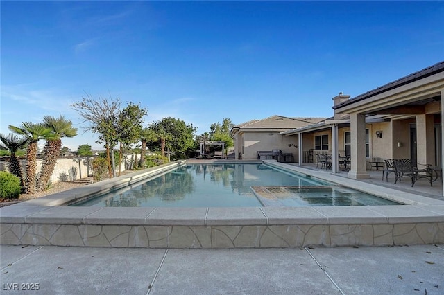 6230 Calm Brook Ct, Las Vegas, NV 89149 - view of swimming pool with a patio and a pool with connected hot tub
