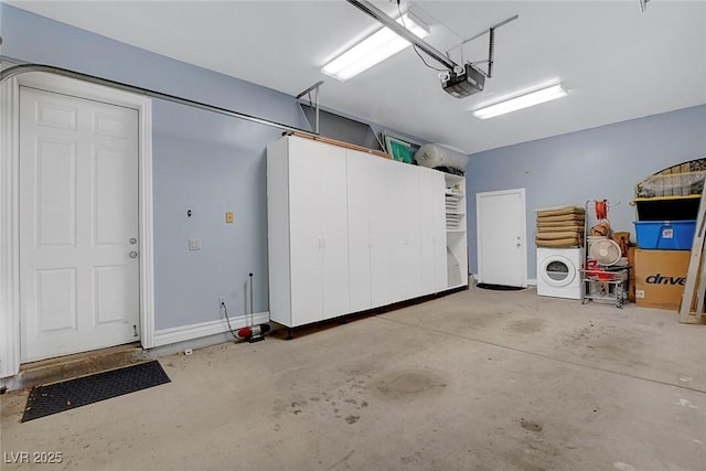 6230 Calm Brook Ct, Las Vegas, NV 89149 - garage with a garage door opener and washer / clothes dryer