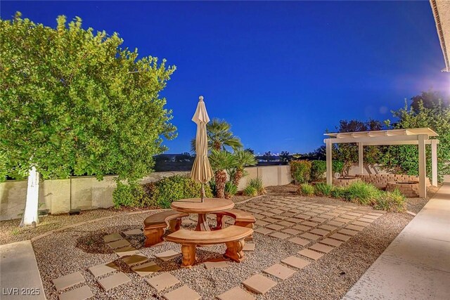 6230 Calm Brook Ct, Las Vegas, NV 89149 - patio at twilight with a patio area