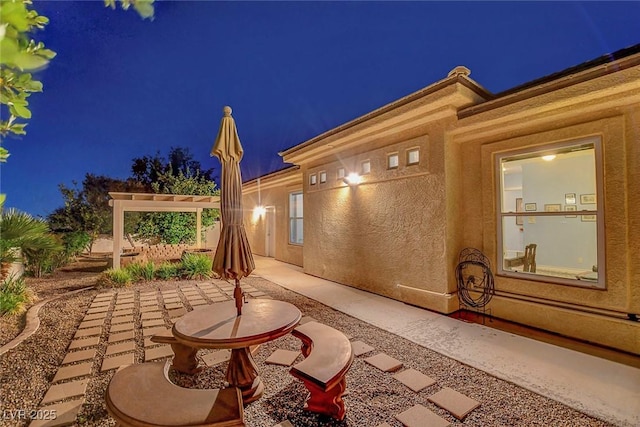 6230 Calm Brook Ct, Las Vegas, NV 89149 - patio at twilight with a patio
