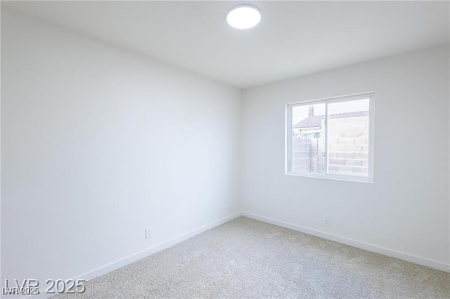 6170 W University Ave, Las Vegas, NV 89103 - empty room with light carpet and baseboards