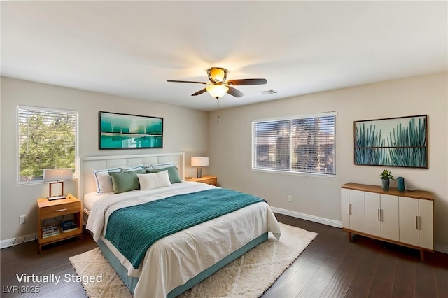 8507 Titania Ct, Las Vegas, NV 89147 - bedroom featuring baseboards, dark wood-style flooring, and ceiling fan