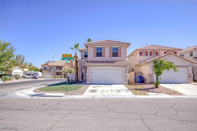 8507 Titania Ct, Las Vegas, NV 89147 - mediterranean / spanish-style house featuring a tiled roof, stucco siding, driveway, and an attached garage