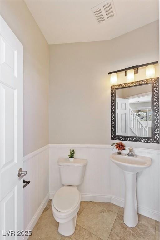 8507 Titania Ct, Las Vegas, NV 89147 - bathroom with toilet and baseboards