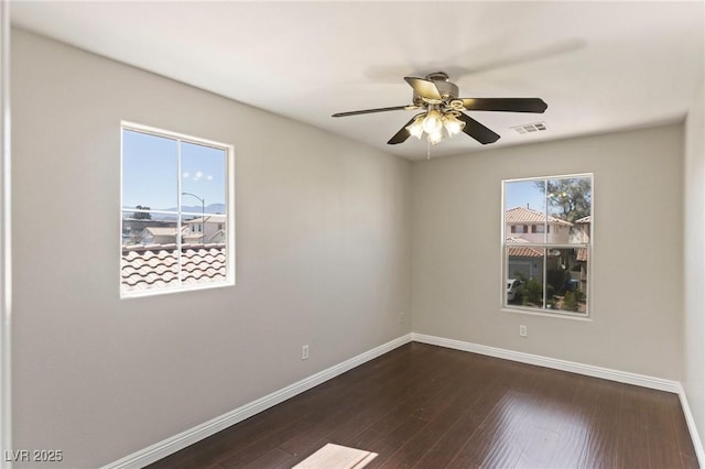8507 Titania Ct, Las Vegas, NV 89147 - unfurnished room with baseboards, wood-type flooring, and ceiling fan