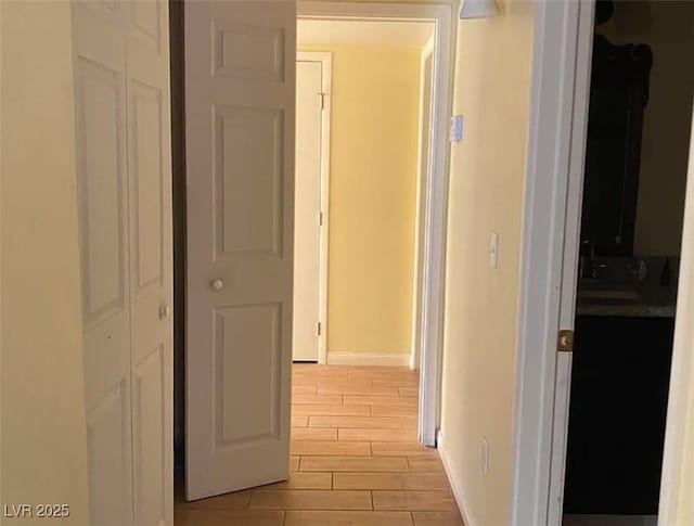 1505 Frank Aved St Unit 101, Las Vegas, NV 89110 - hallway with wood tiled floors and baseboards