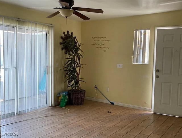 1505 Frank Aved St Unit 101, Las Vegas, NV 89110 - foyer entrance featuring a ceiling fan, light wood-style floors, and baseboards