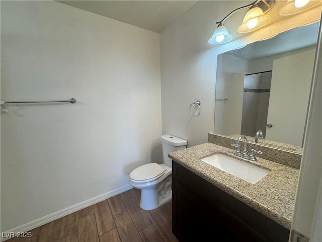 1505 Frank Aved St Unit 101, Las Vegas, NV 89110 - bathroom featuring wood finished floors, vanity, and a shower