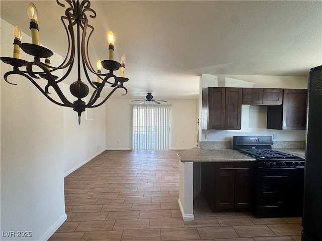 1505 Frank Aved St Unit 101, Las Vegas, NV 89110 - kitchen with gas stove, a chandelier, light countertops, dark brown cabinets, and wood tiled floors