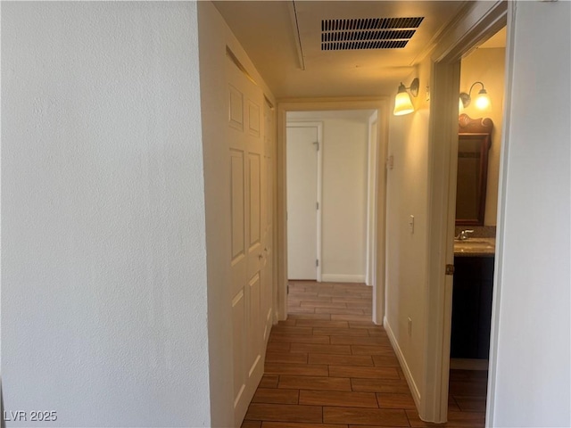 1505 Frank Aved St Unit 101, Las Vegas, NV 89110 - hall with wood finish floors and baseboards