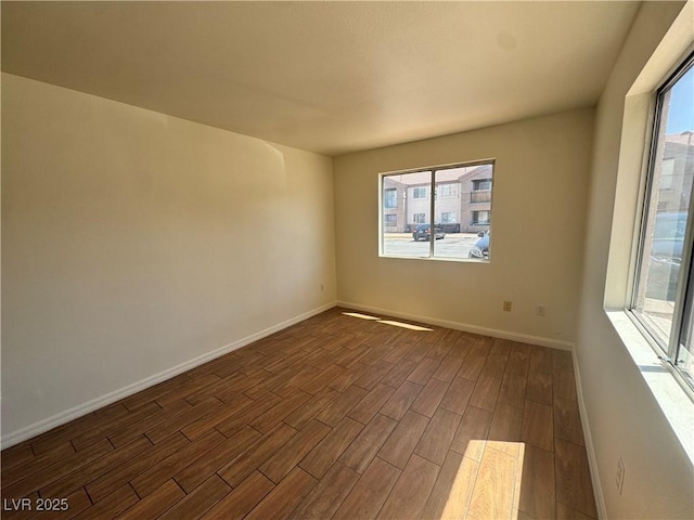 1505 Frank Aved St Unit 101, Las Vegas, NV 89110 - unfurnished room with dark wood finished floors and baseboards