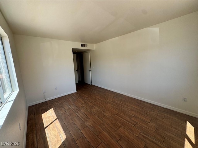 1505 Frank Aved St Unit 101, Las Vegas, NV 89110 - unfurnished room featuring dark wood finished floors and baseboards