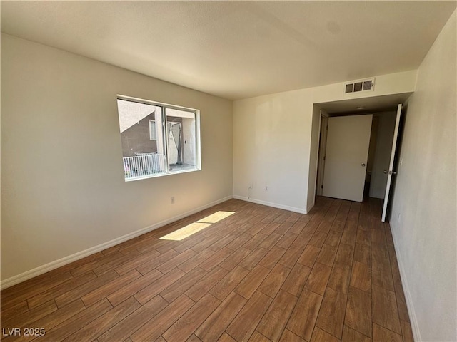 1505 Frank Aved St Unit 101, Las Vegas, NV 89110 - empty room with dark wood-style floors and baseboards