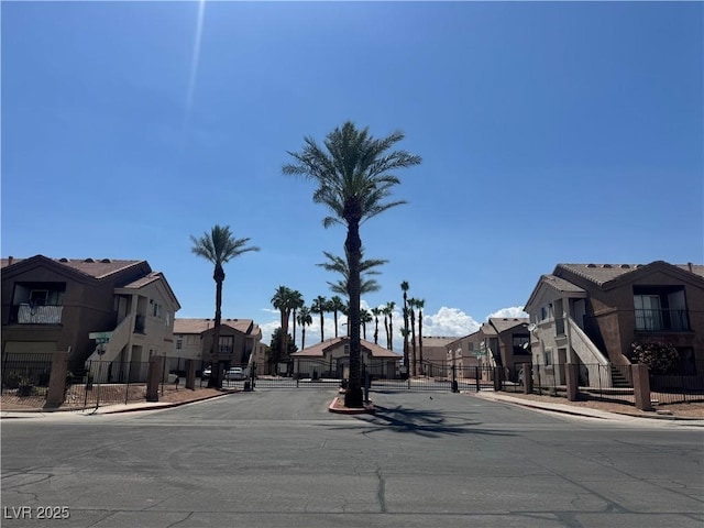 1505 Frank Aved St Unit 101, Las Vegas, NV 89110 - view of asphalt road with sidewalks, curbs, and a residential view