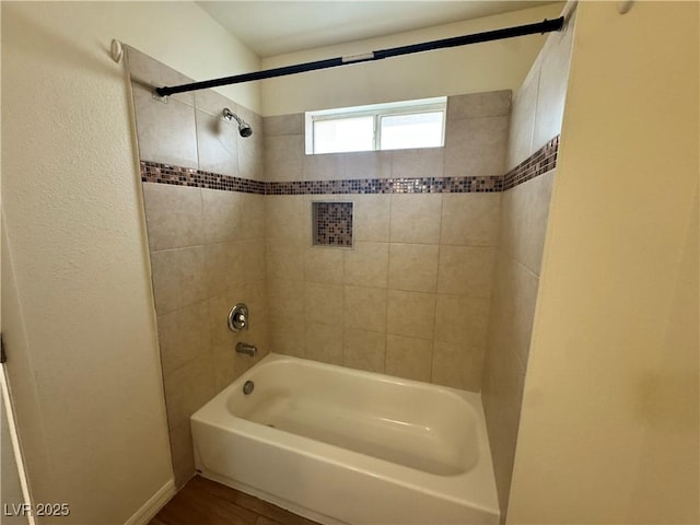 1505 Frank Aved St Unit 101, Las Vegas, NV 89110 - full bathroom featuring  shower combination and wood finished floors