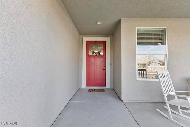 1395 Logandale Dr, Logandale, NV 89021 - view of exterior entry featuring stucco siding