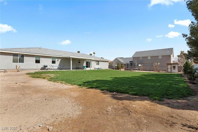 1395 Logandale Dr, Logandale, NV 89021 - rear view of house with a patio area