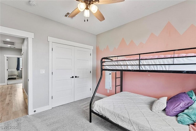 1395 Logandale Dr, Logandale, NV 89021 - carpeted bedroom featuring baseboards, a closet, and a ceiling fan