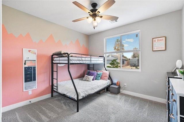 1395 Logandale Dr, Logandale, NV 89021 - bedroom with carpet flooring, baseboards, and a ceiling fan