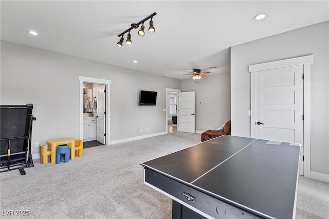 1395 Logandale Dr, Logandale, NV 89021 - playroom featuring carpet floors, ceiling fan, baseboards, recessed lighting, and track lighting