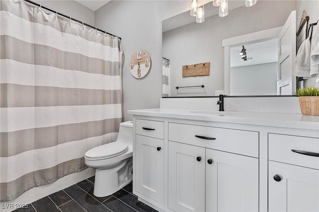 1395 Logandale Dr, Logandale, NV 89021 - bathroom featuring toilet, vanity, and a shower with curtain