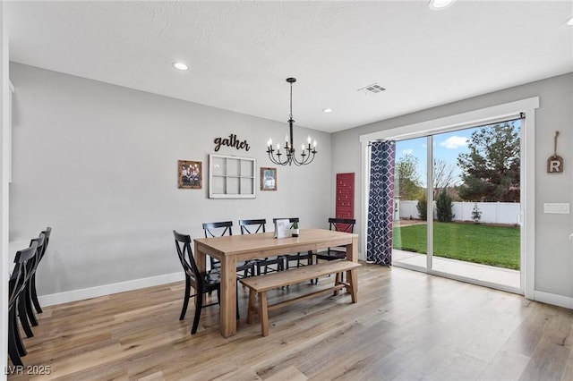 1395 Logandale Dr, Logandale, NV 89021 - dining space featuring a chandelier, light wood-style floors, baseboards, and recessed lighting