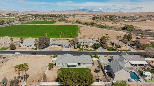 1395 Logandale Dr, Logandale, NV 89021 - aerial perspective of suburban area with mountains
