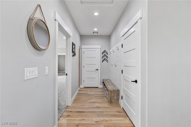1395 Logandale Dr, Logandale, NV 89021 - corridor with recessed lighting, light wood-style flooring, and baseboards
