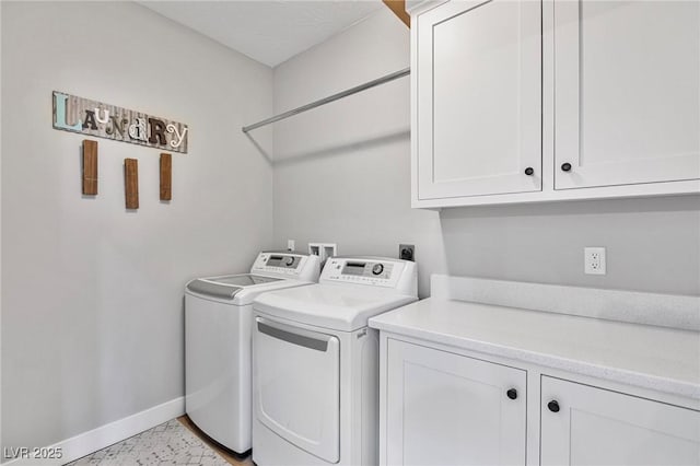 1395 Logandale Dr, Logandale, NV 89021 - washroom with cabinet space, separate washer and dryer, and baseboards