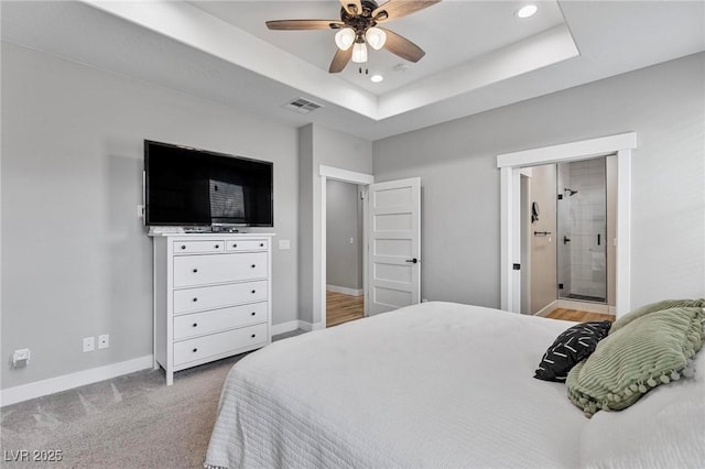 1395 Logandale Dr, Logandale, NV 89021 - bedroom featuring baseboards, recessed lighting, ensuite bathroom, a raised ceiling, and ceiling fan