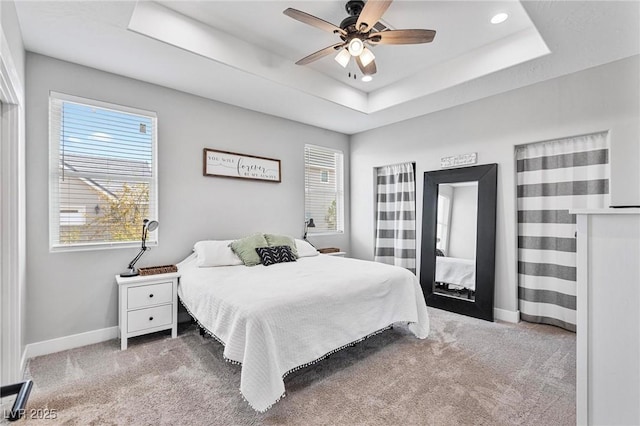 1395 Logandale Dr, Logandale, NV 89021 - bedroom featuring multiple windows, carpet, a raised ceiling, and recessed lighting