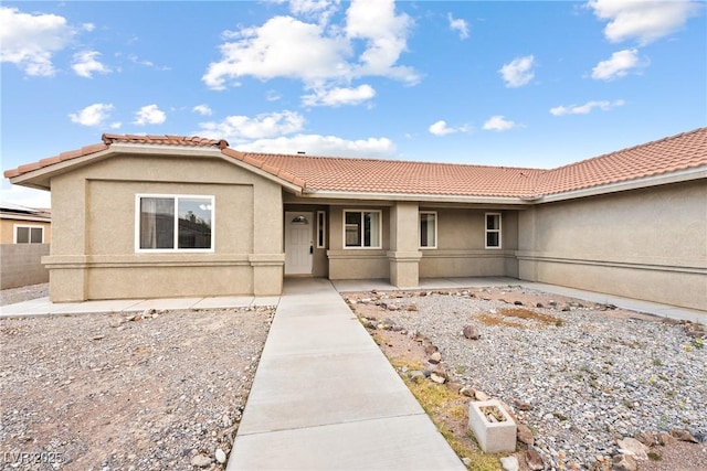 654 Mazelle Ln, Pahrump, NV 89060 - view of front facade featuring a tile roof and stucco siding
