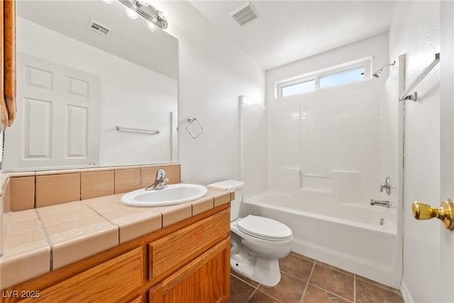 654 Mazelle Ln, Pahrump, NV 89060 - full bath featuring toilet, vanity, washtub / shower combination, and tile patterned floors