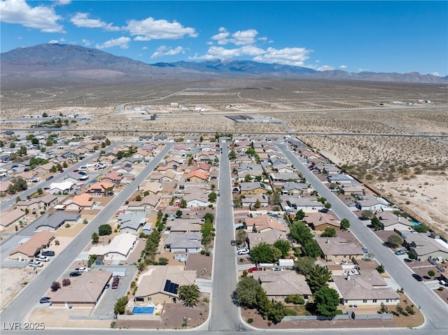 654 Mazelle Ln, Pahrump, NV 89060 - aerial perspective of suburban area with mountains
