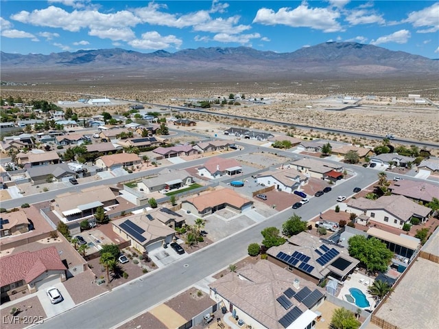 654 Mazelle Ln, Pahrump, NV 89060 - aerial view of residential area featuring a mountainous background
