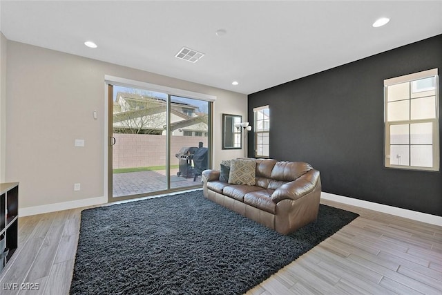625 Honesty Ct, Henderson, NV 89011 - living room with light wood-type flooring, recessed lighting, and baseboards