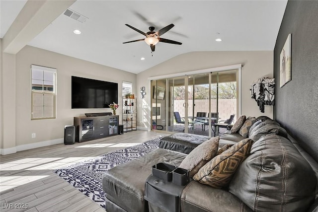 625 Honesty Ct, Henderson, NV 89011 - living room with ceiling fan, lofted ceiling, wood finished floors, recessed lighting, and baseboards
