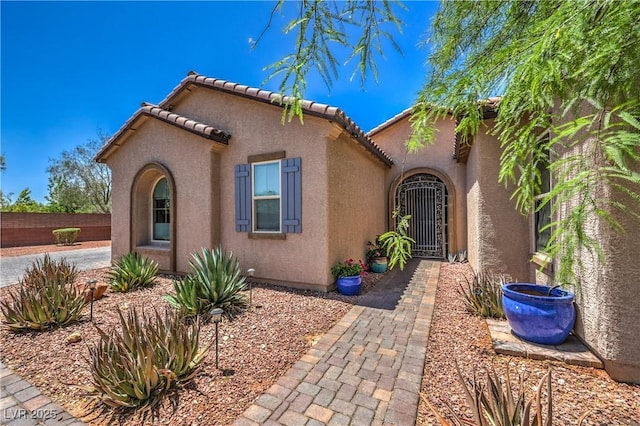 10319 Larkmead Ave, Las Vegas, NV 89149 - view of front of home featuring stucco siding and a tile roof