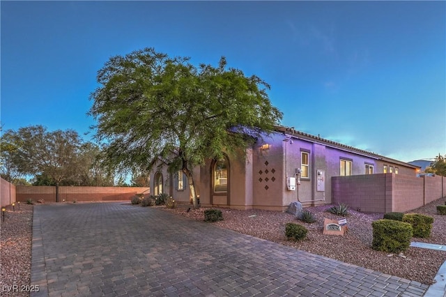 10319 Larkmead Ave, Las Vegas, NV 89149 - view of front of property with stucco siding and driveway